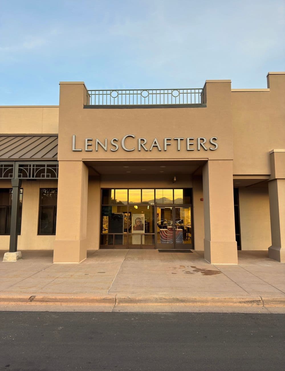 LensCrafters storefront with clear signage and entrance, located in shopping plaza.